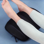 Jambe sur le Repose Pied Chauffant Massant