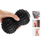 Main qui tient Balle de Massage Vibrante